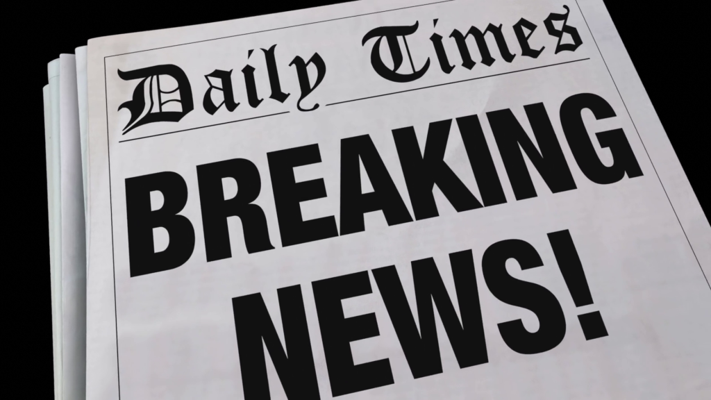 Headlines In A Newspaper
